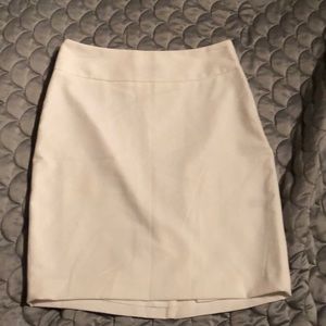 The limited white pencil skirt size 0